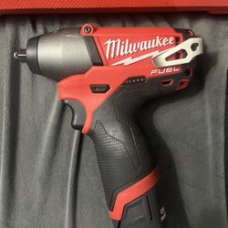 Milwaukee FUEL M12 3/8 Impact Wrench W/HIGH OUTPUT BATTERY Plus 3/8 Socket Set 