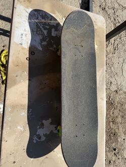 Baker Tyson skateboard w/ bones wheels- good condition