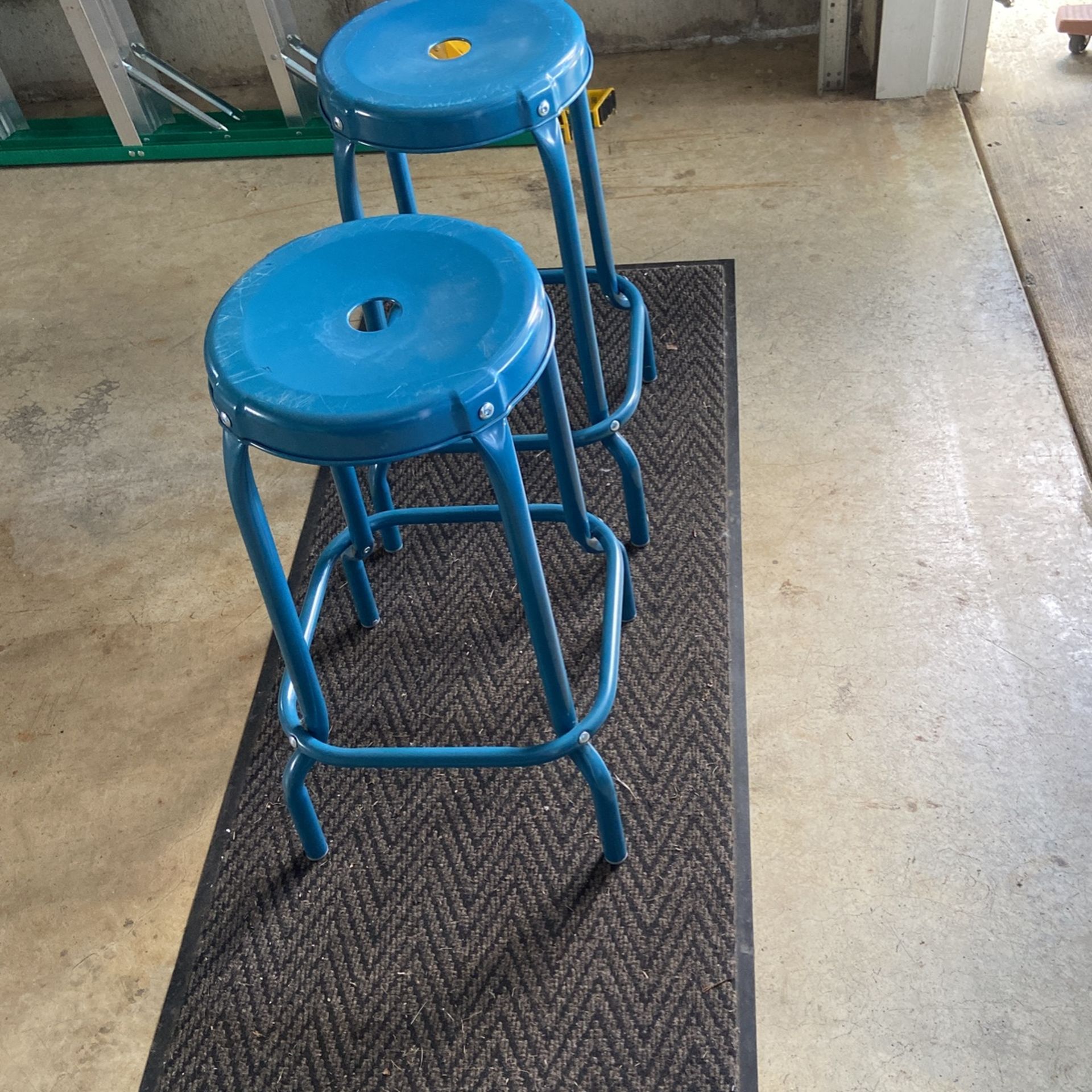 Two Blue Metal Stools