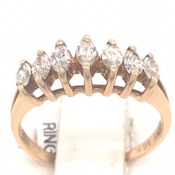 0.30 TCW marquis cut diamonds pyramid ring is solid 14k yellow gold