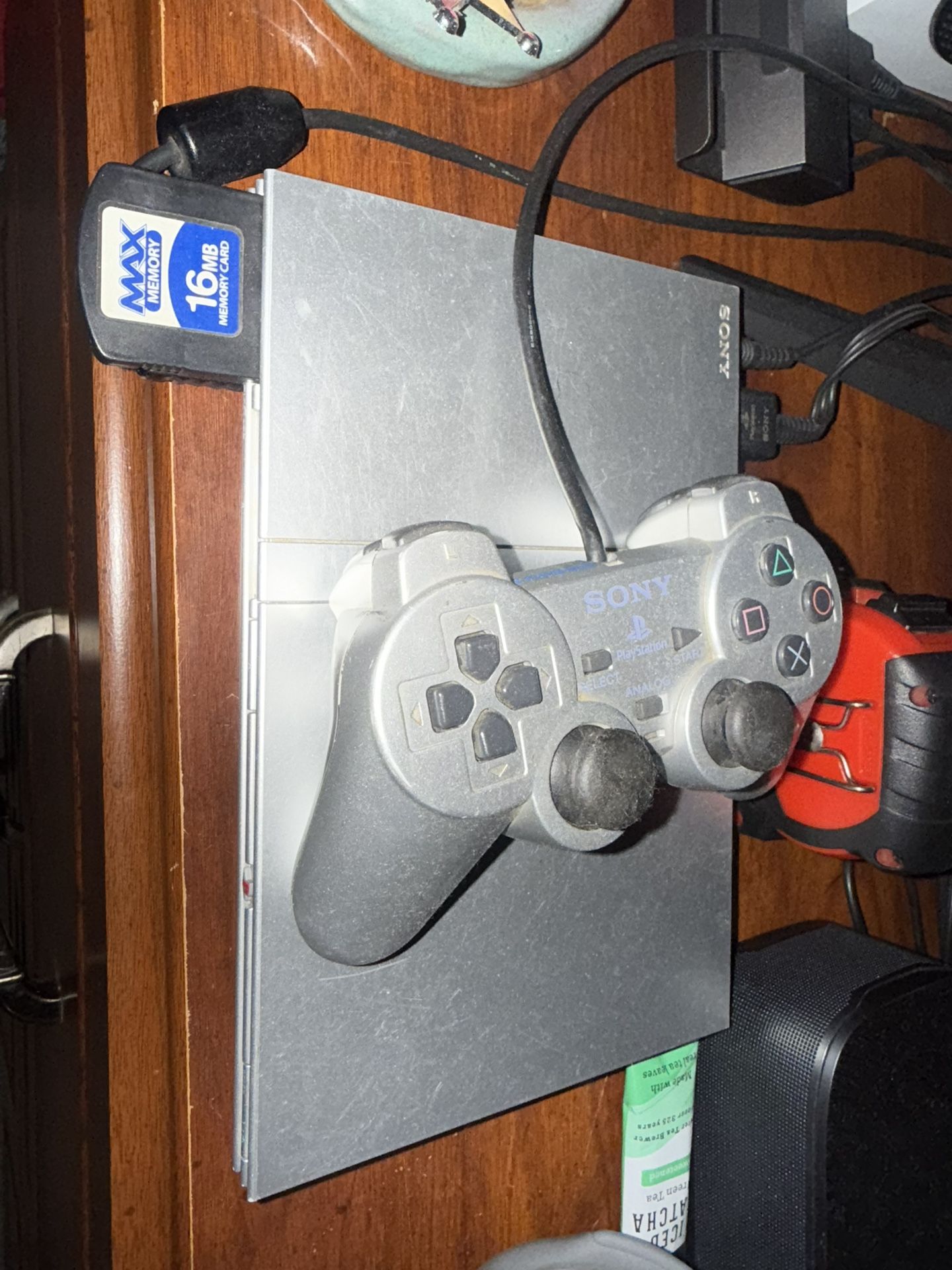 PS2 SLIM SILVER WITH GAMES