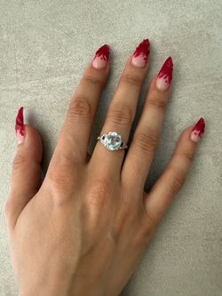 Genuine 2.5 carat aquamarine with sapphire and diamonds