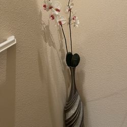 Tall decorative flower vase with artificial flowers