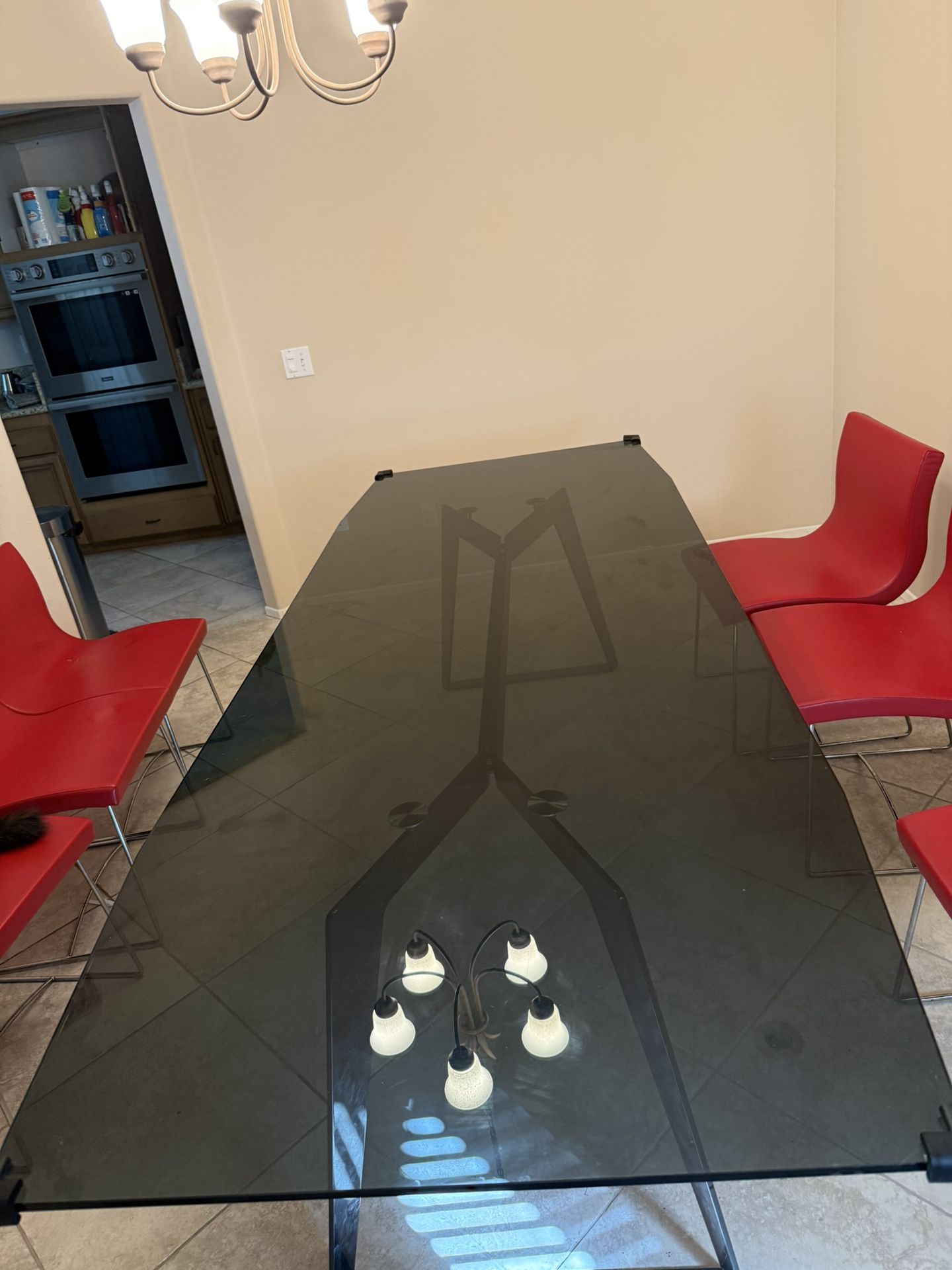 Roche Bobois “Echoes” Dining Table – Smoked Glass & Sculptural Steel Base (Minor Imperfection)