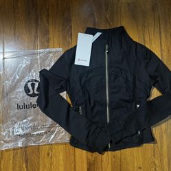 Black lululemon jacket with Gold zipper