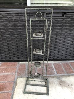 Iron candle holder