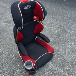 Graco Black and Red High Back Kid’s Booster Car Seat with cup holder! Good condition!