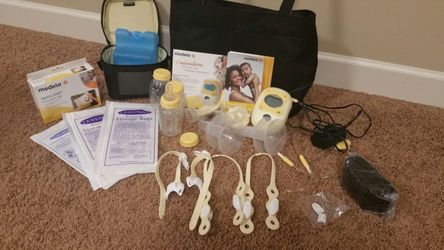 Medela freestyle hands pump + quick clean bags + storage bags