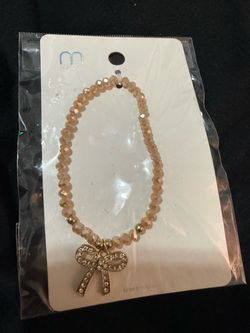 Beaded Bracelet with Bow Charm