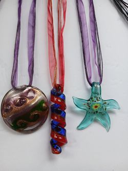 Three new handcrafted glass pendant necklaces