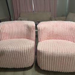 PINK SWIVEL ACCENT CHAIRS 