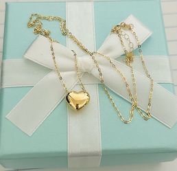 18k gold lightweight movable heart necklace 18”