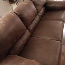 Ashley Brown Couch with oversized Recliner and Ottoman