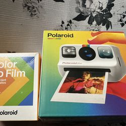 Polaroid Camera And Film 