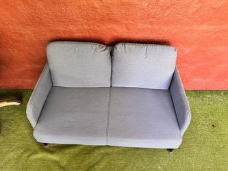 Light Blue Sofa $380