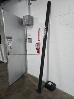 Rogue Black steel Rogue upright post with laser-cut holes and a bolt-on base plate. 

Single upright from a Rogue rack system.