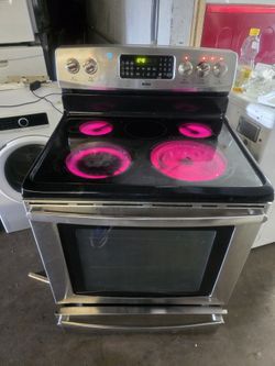 maytag Four Burner Glass Top Electric Stove.