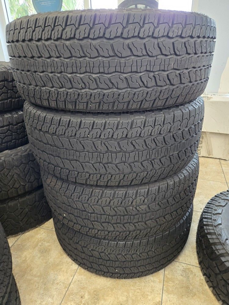 (4) 305/55r22 Goodyear A/T Tires 305 55 22 Inch AT 10-PLY LT E RATED 35 INCH