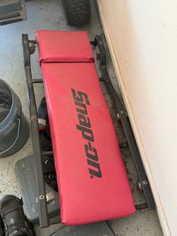 Snap on padded rolling creeper