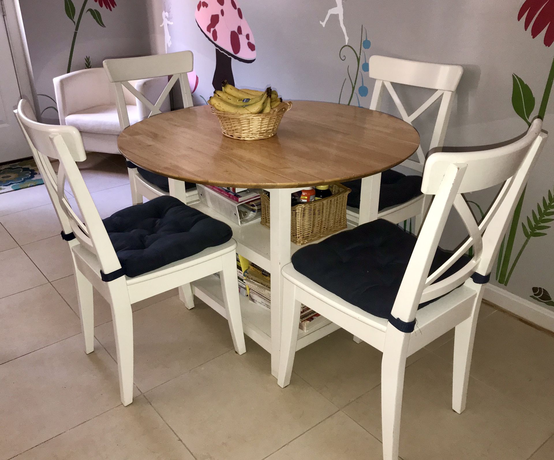 Dining Table with 2 drop leaves, two shelves and four chairs