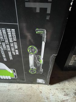 Mower new in box with battery included $1000