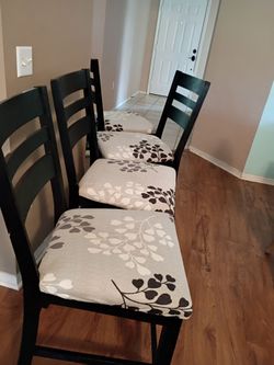 Four high top chairs