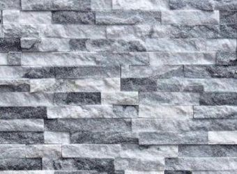 Natural stone ledger panels
