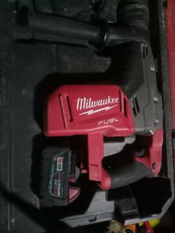 Rotary hammer and battery