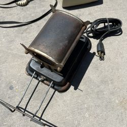 Antique Iron Curling $20