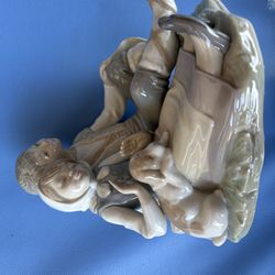 Lladro boy and girl with puppy