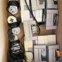 Two Super Nintendo’s With Three Controllers And Six Games