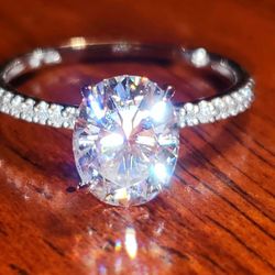 Stella Grace 2 ct. T.W. Oval Cut Lab-Created Moissanite & 1/10 ct. T.W. Diamond Engagement Ring