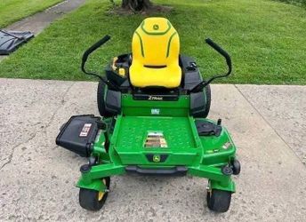 Riding lawn mower John Deere e130 42" 22hp Message