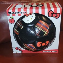 Hello Kitty size 5 soccer ball with a black and tartan plaid design. 
Size: The ball is a regulation size 5. 
Design: It features a unique black and p