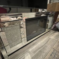 Mirrored Entertainment Center With Fireplace