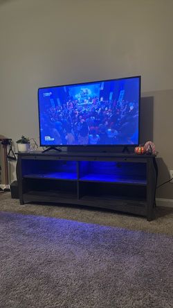 Large Flat Screen 50 “ 4K Smart TV and LED Stand for Sale