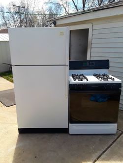 Whirlpool refrigerator and GE stove combo