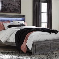 Baystorm Queen Panel Bed with 2 Storage Drawers from Ashley Furniture