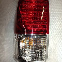 Brand New Driver Side Tail Light For A 2007 To 2014 Toyota Tundra