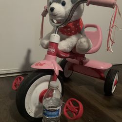 pink tricycle in very good condition