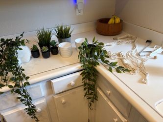 Artificial plant and pot bundle
