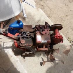 2 HP  MOTOR TURN$ ON MAY NEED A CARBURATOR TUNE UP
