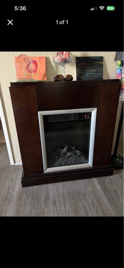 Indoor fireplace lights up and heats