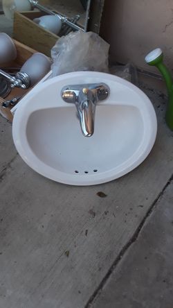 Bathroom sink with faucet