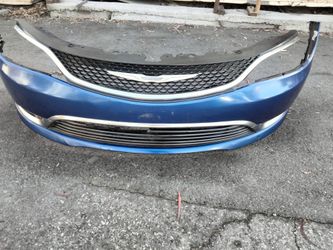 2015-2017 Chrysler 200 complete front bumper with all the accessories OEM .