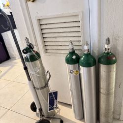 4 Oxygen Cylinders (Cart Included)