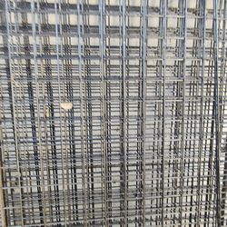 Metal para colgar  la ropa en tienda