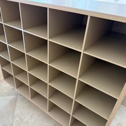  25-Shoe Cube Organizer -  25 individual cubbies for organizing shoes, hobbies and more.  Approx Dimension 31.50in x 24.13in x 11.63in