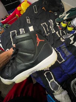 Air Jordan 11 Black and White Sneakers