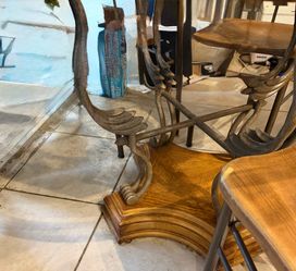 Wood and brown metal base and 48 inch glass top